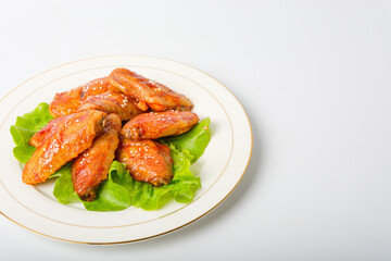 A plate of Orleans grilled chicken wings