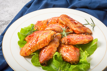 A plate of Orleans grilled chicken wings