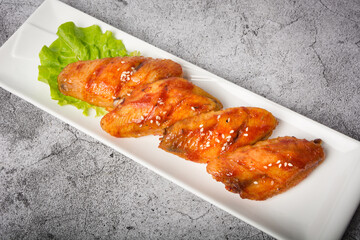 A plate of Orleans grilled chicken wings