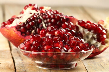 Broken pomegranate. Pomegranate seeds close-up.