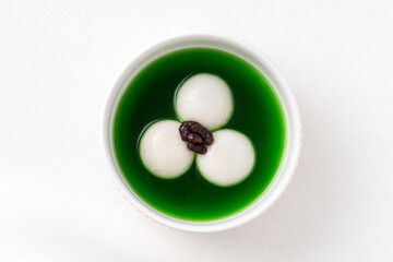 Matcha big tangyuan with red bean paste and matcha soup.
