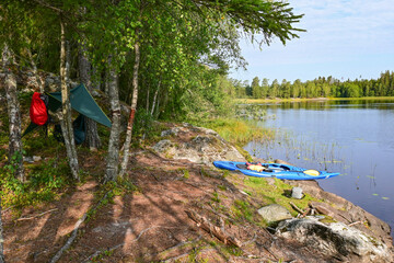 Camp on lake shore in Scandinavia, wild vivac camping in Norway