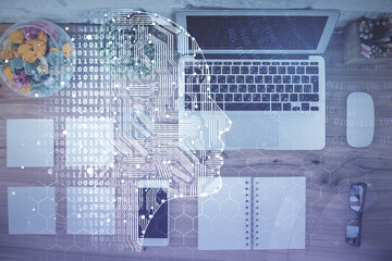 Double exposure of brain drawing hologram over topview work table background with computer. Concept of big data.