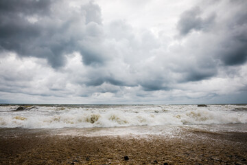 Storm clouds over the sea. Dramatic sky and giant waves