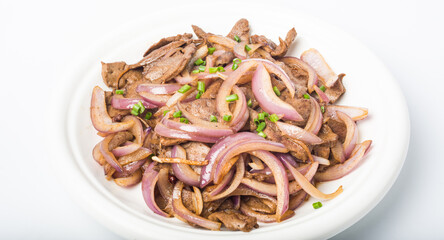 A dish of sauce on a white background explodes the pig liver