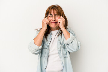 Middle age caucasian woman isolated on white background whining and crying disconsolately.