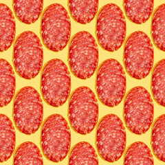 Seamless pattern with sausage slice on yellow background.