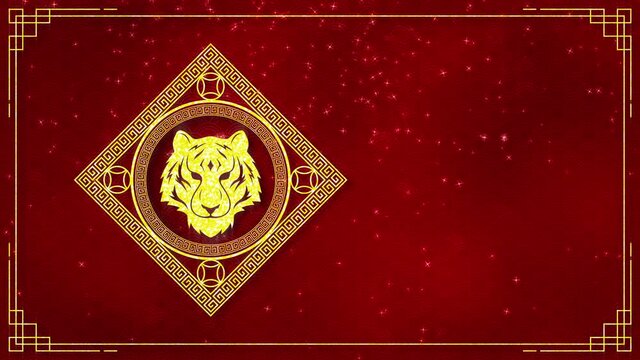 Motion graphic of Golden tiger logo with chinese new year and year of the Tiger 2022 on dark red background and glitter particle in a happy new year concept seamless loop video