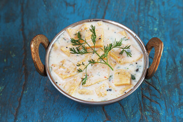 Home Made Indian Raita Made of Curd & Black Gram Flour.