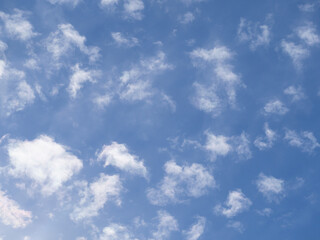 Blue sky background and white clouds soft focus, and copy space. Abstract white cloud and blue sky texture background
