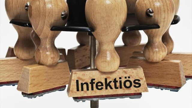 Viele Stempel h&auml;ngen in einem Stempelst&auml;nder, einer hat die Beschriftung Infekti&ouml;s
