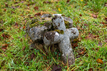 Ancient gravestones in Church graveyard on an overcast day