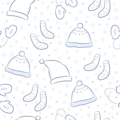 Seamless pattern with winter accessories. Blue background with cute hats, mittens and socks. Vector illustration