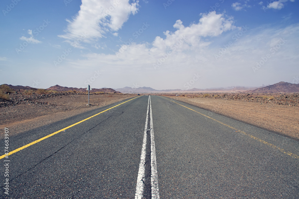 Sticker the road in al shaq great canyon, saudi arabia