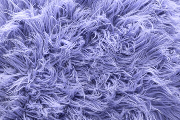 Color of the year 2022, Very Peri. Top view Fluffy wool texture sample. Fashionable beauty, trendy and modern design concept.
