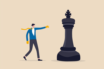 Challenge and strategy to win business competition, tactic, skill and leadership to win rivalry battle, plan to knock out competitor concept, businessman with boxing glove fight with big chess king.
