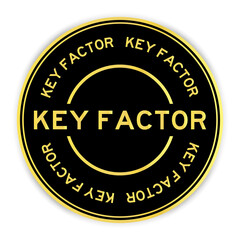 Black and gold color round label sticker with word key factor on white background