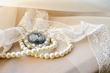 vintage cameo, pearls and lace