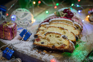 Fototapeta na wymiar Stollen. Christmas holiday cupcake with dried fruits. 