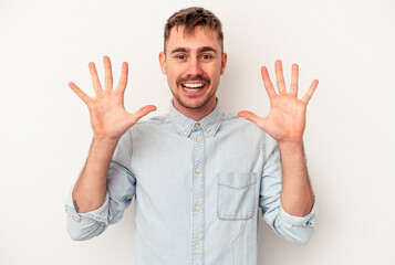 Young caucasian man isolated on white background shouting excited to front.