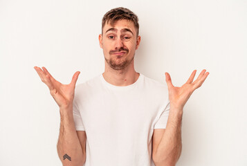 Fototapeta premium Young caucasian man isolated on white background pointing to the side