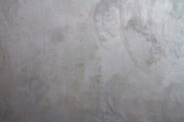 Naklejka premium Grey plastered wall covered with rough textured plaster. Background. copy space
