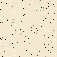Abstract seamless pattern. Dots are located chaotically. Vector design for textiles and packaging