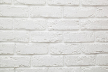 A close-up of a white brick wall.