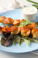 Concept of tasty food with chicken shashlik on white background