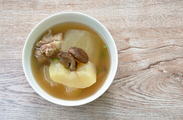 boiled winter melon with pork bone and mushroom soup on bowl