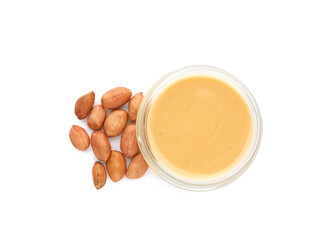 Jar with delicious peanut butter and nuts on white background, top view