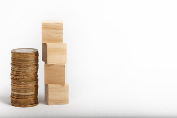 tax time. money and economy concept. wooden cube blocks, isolated on white background.