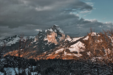 snow-covered mountains in the evening