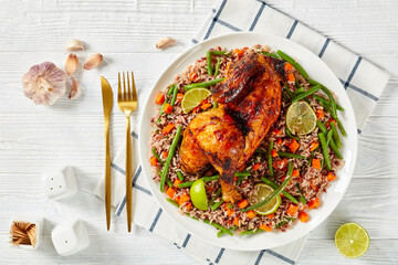 Roasted Half Chicken with brown rice on a platter