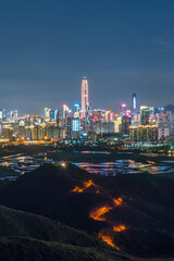 Fototapeta premium Night scenery of panorama of skyline of Shenzhen city, China. Viewed from Hong Kong border
