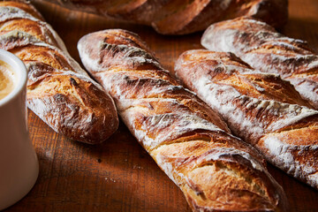 Fresh baguette bread and coffee 