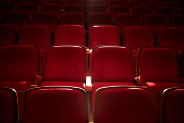 Rows of red seats in a concert hall