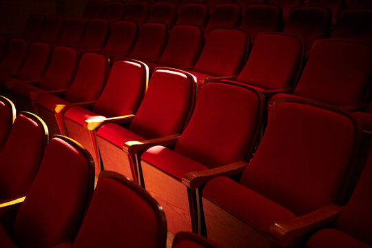 Rows of red seats in a concert hall
