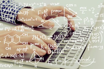 Double exposure of creative concept with hands typing on laptop on background, research and development concept