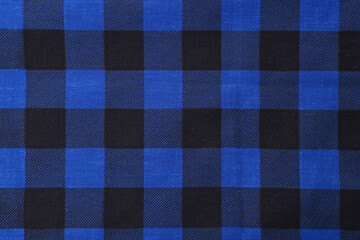 Top view of blue bandana with check pattern as background