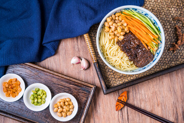 Beijing cuisine old Beijing fried sauce noodles placed on wooden table