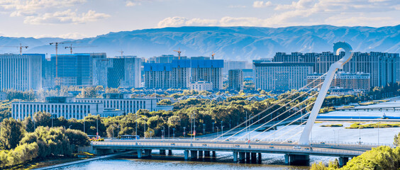 Fototapeta na wymiar Cityscape of Matouqin Bridge in Hohhot, Inner Mongolia, China
