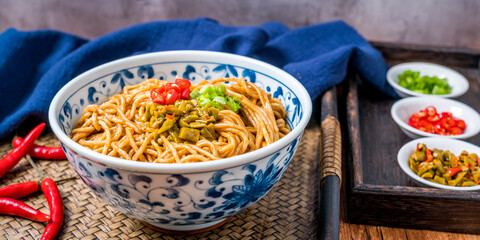 Wuhan gourmet hot dry noodles placed on wooden table 