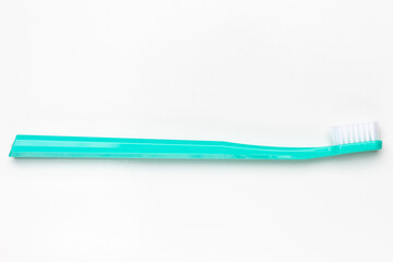 Turquoise Toothbrush. Isolated on white background