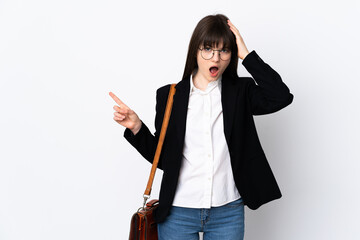 Obraz premium Ukranian business woman isolated on white background surprised and pointing finger to the side