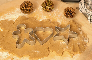 the process of making gingerbread men cookies , christmas cookies