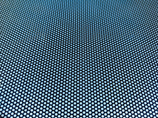 Blurred abstract background perforated pattern with moire effect.