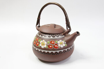 small ceramic clay teapot, isolated