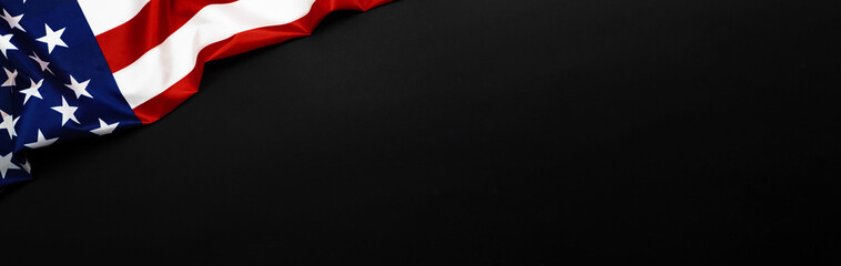 American flag for Memorial Day, 4th of July or Labour Day. Banner, USA flag on black background, copy space, top view photo