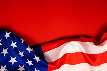 Flag of the United States of America on red background